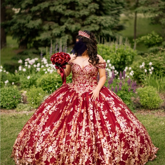 Elegant Red and Gold Gown with Tiara